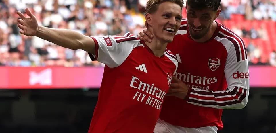 Arsenal players celebrating a goal during match