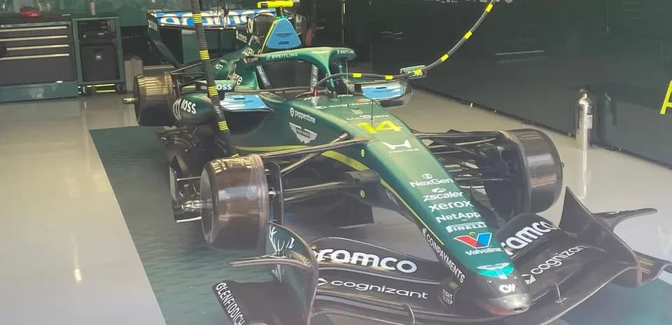 Aston Martin Formula 1 car in team garage