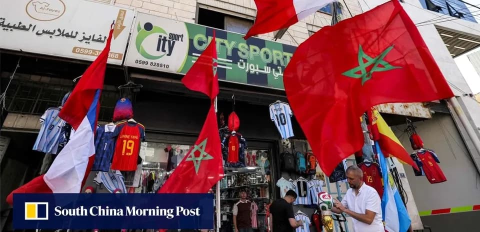 Flags and jerseys displayed outside sports shop
