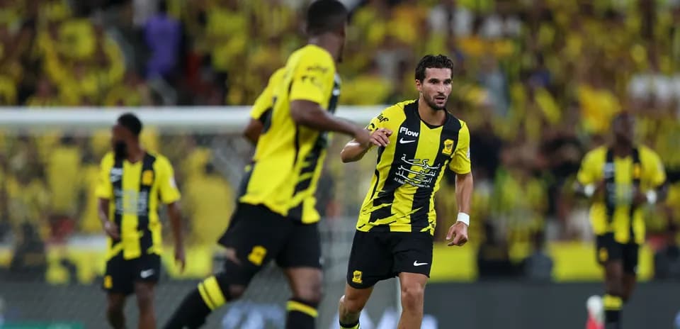 Ittihad players in action during a match