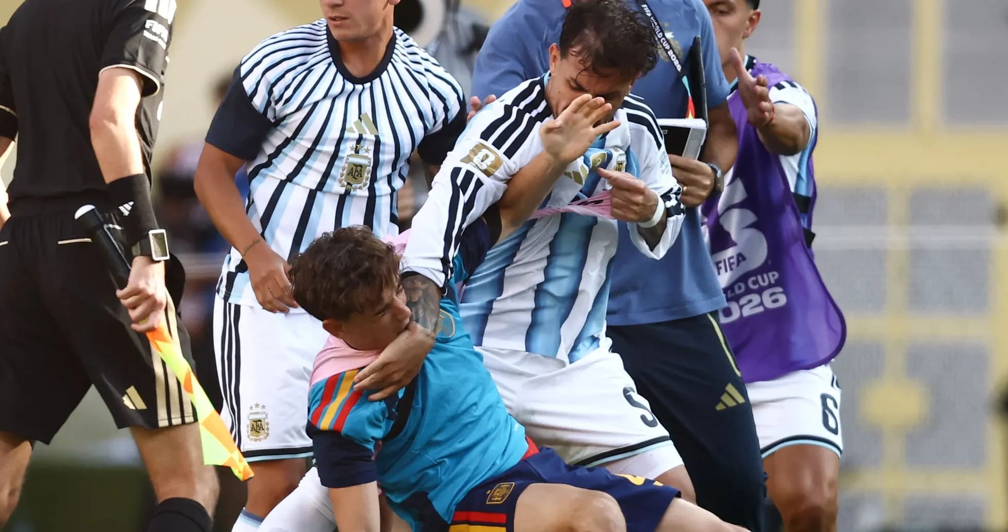 Players from Argentina and Spain in a scuffle