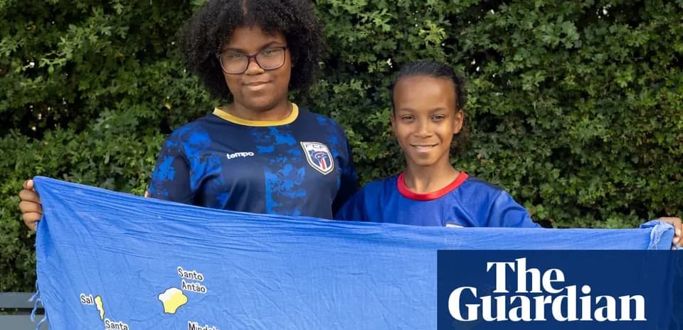 Two children holding a blue map of Cape Verde