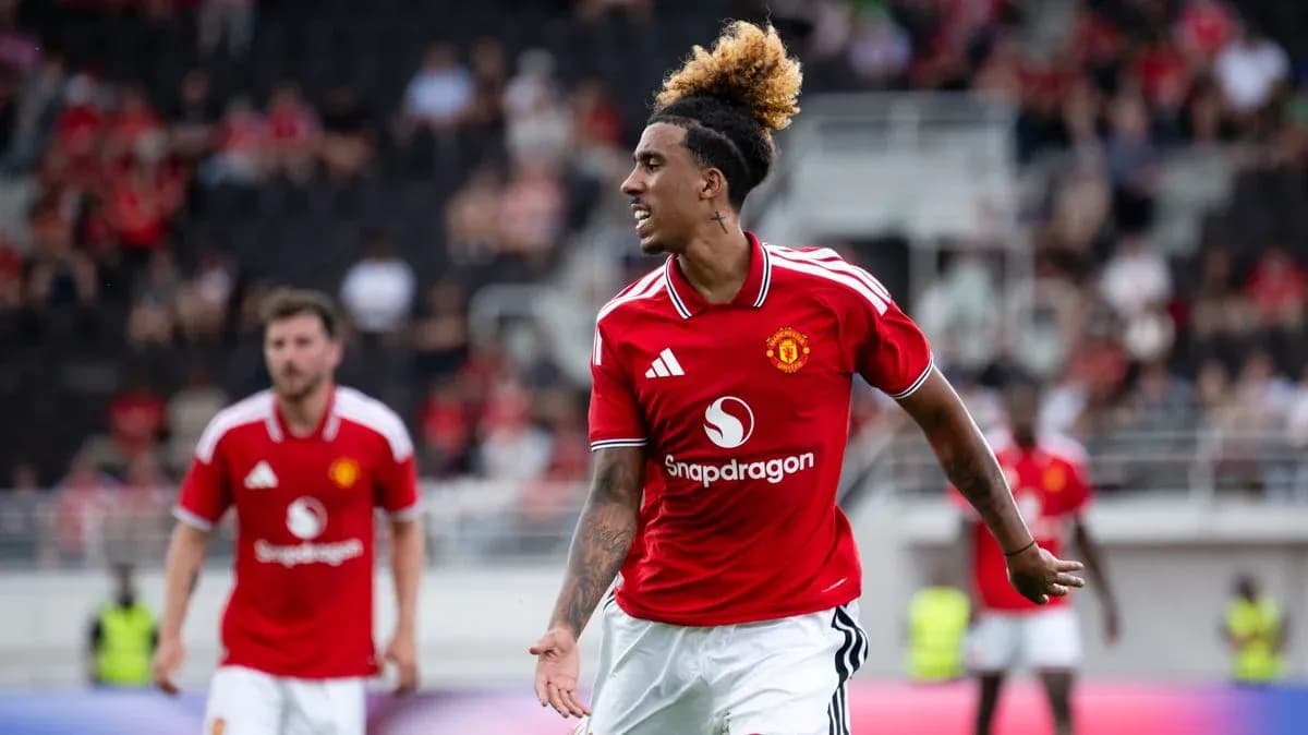 Manchester United player celebrating during match Manchester United player celebrating during match