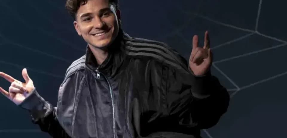 Young man posing with peace sign and smile