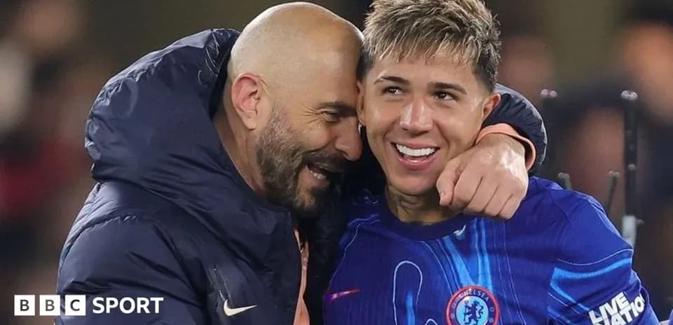 Coach and player celebrating after the match