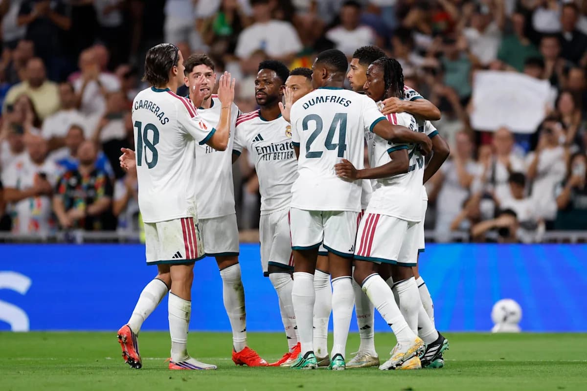 Real Madrid players celebrating a goal together Real Madrid players celebrating a goal together