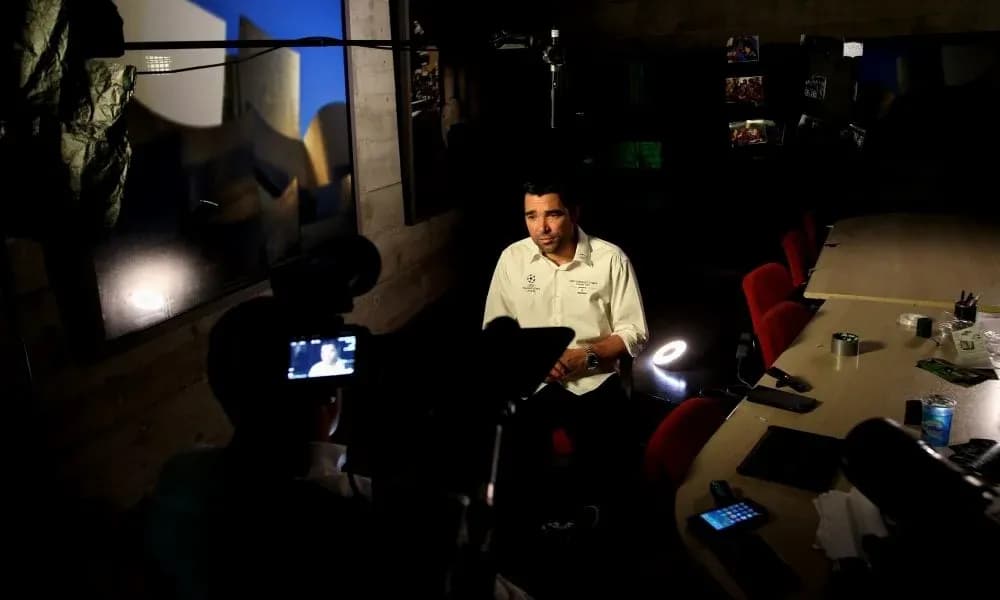 Interviewer speaking during an interview setup Interviewer speaking during an interview setup