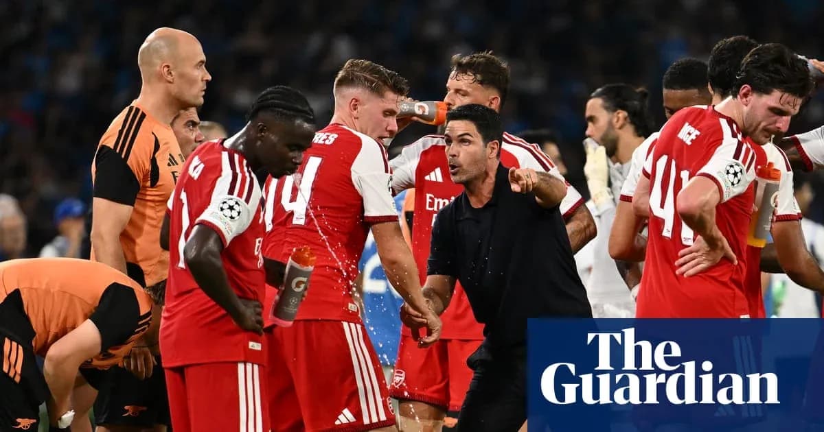 Arsenal players gathered around coach during match break Arsenal players gathered around coach during match break