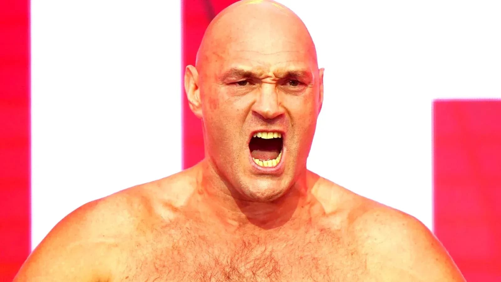 Bald man shouting with intense expression on stage Bald man shouting with intense expression on stage