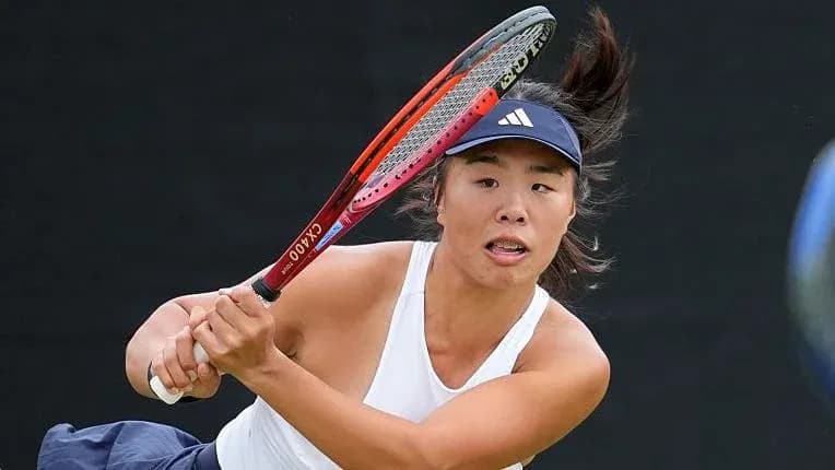 Tennis player hitting a forehand stroke Tennis player hitting a forehand stroke