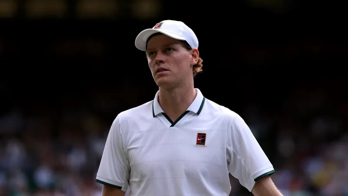 Tennis player walking off court at Wimbledon Tennis player walking off court at Wimbledon