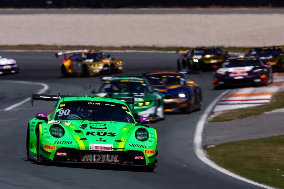 Green racing car leading in a DTM race Green racing car leading in a DTM race