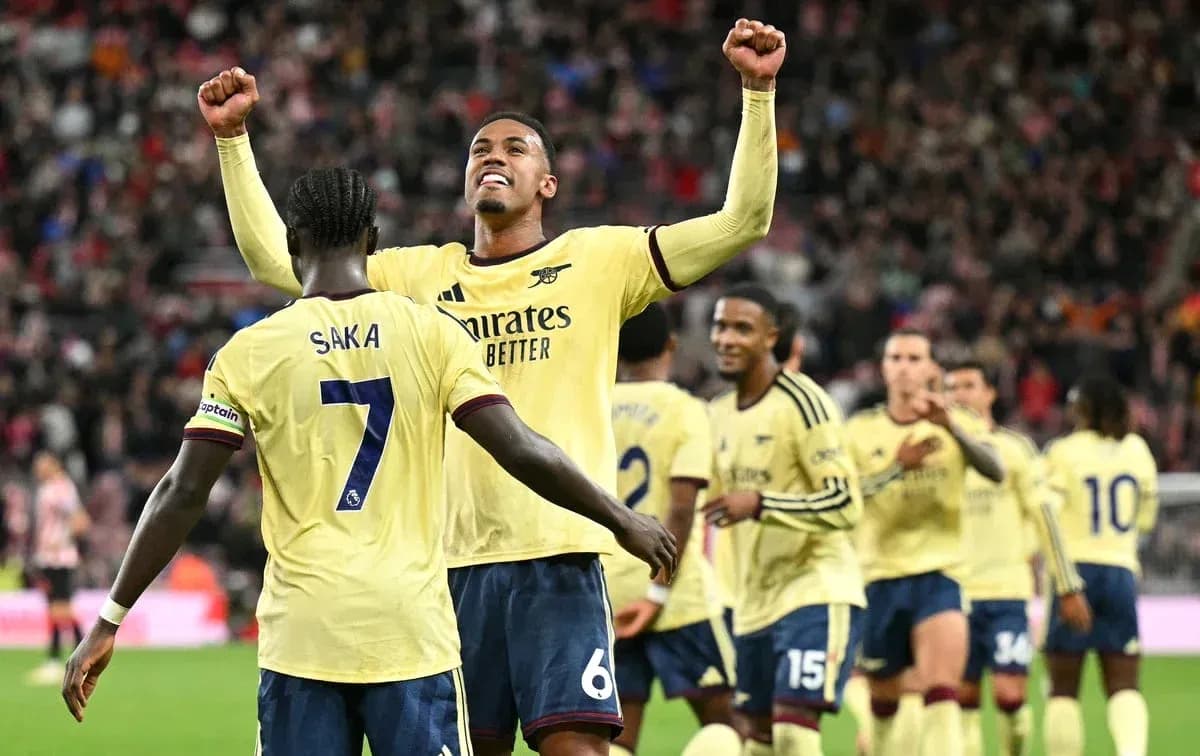Arsenal players celebrating a goal during match Arsenal players celebrating a goal during match