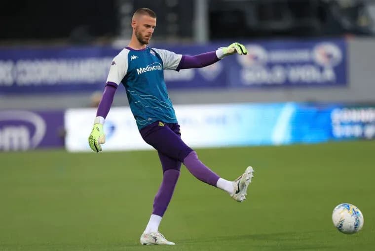 Goalkeeper preparing to kick ball during training Goalkeeper preparing to kick ball during training