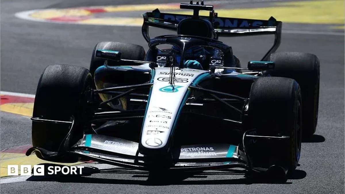 Mercedes Formula 1 car on track during race Mercedes Formula 1 car on track during race