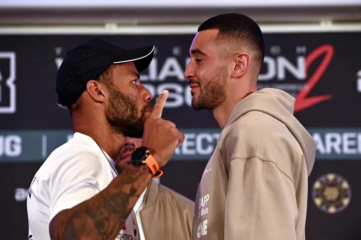 Two boxers facing off during press conference stare down Two boxers facing off during press conference stare down