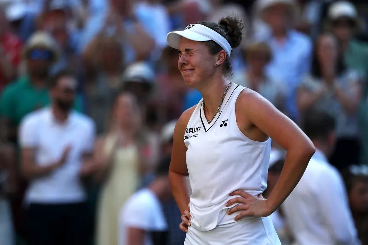 Tennis player reacting during match at Wimbledon Tennis player reacting during match at Wimbledon