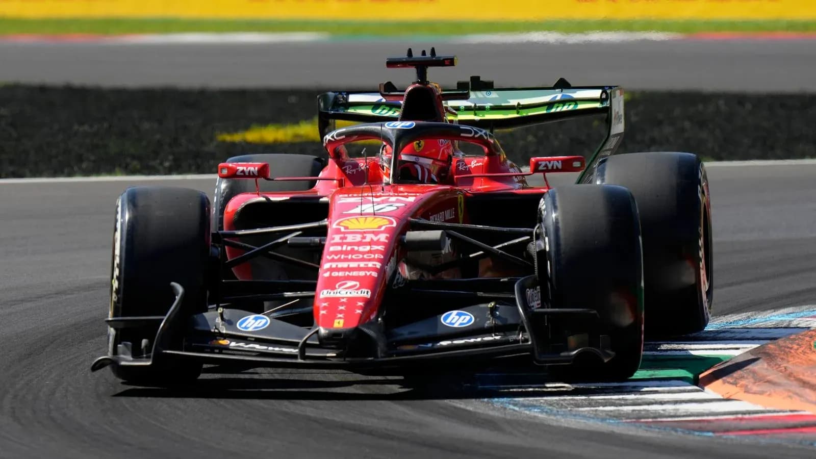 Formula 1 car racing on track during event Formula 1 car racing on track during event