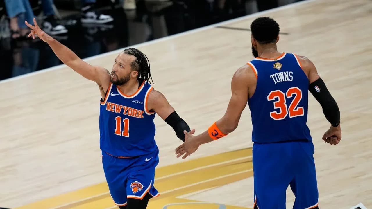 New York Knicks players celebrating during a game New York Knicks players celebrating during a game