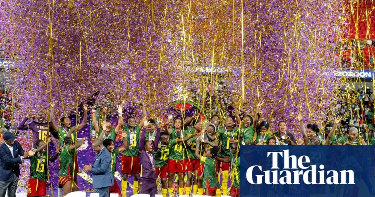 Cameroon women's football team celebrating victory with confetti Cameroon women's football team celebrating victory with confetti