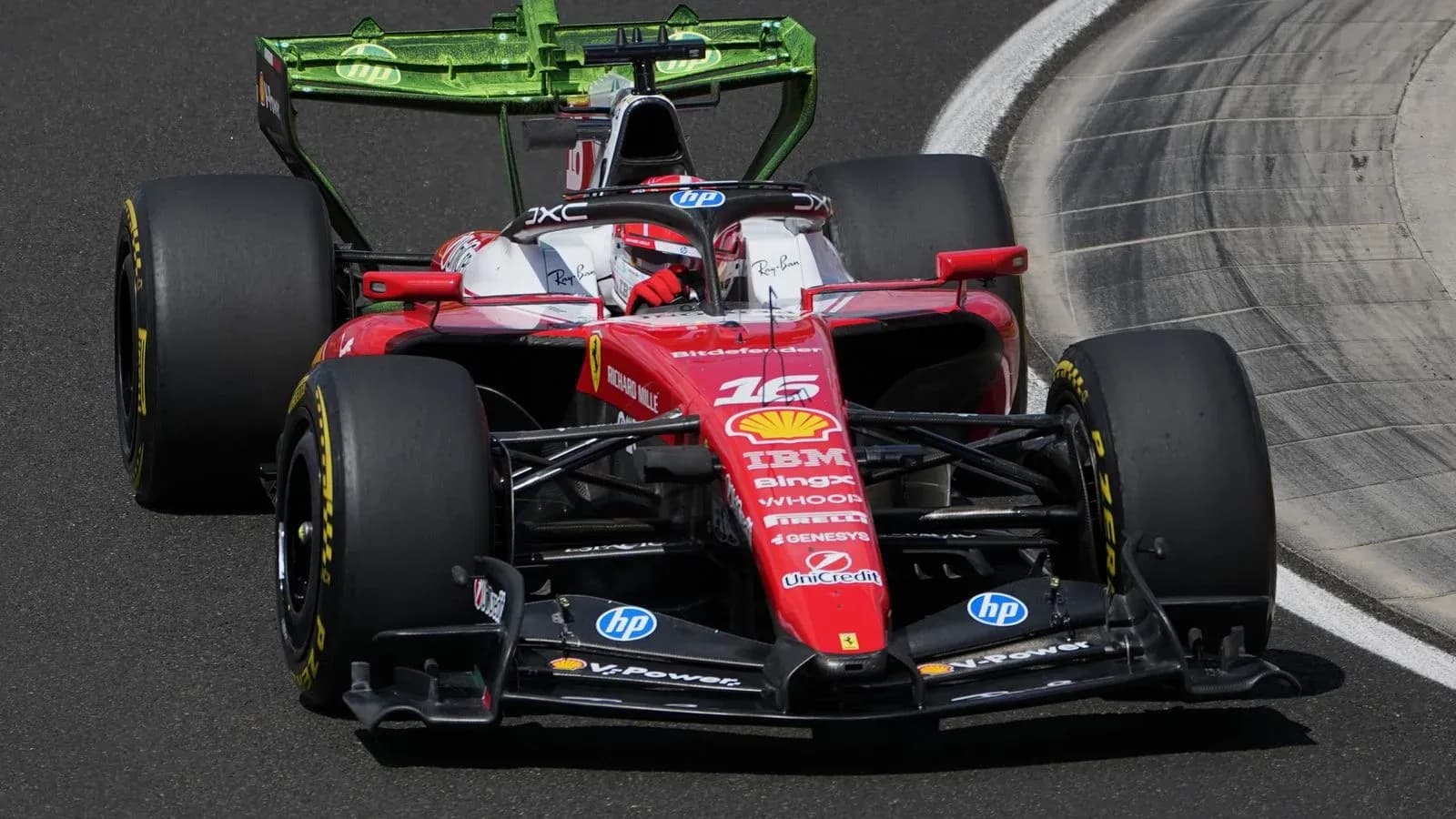 Ferrari racing car on track during competition Ferrari racing car on track during competition