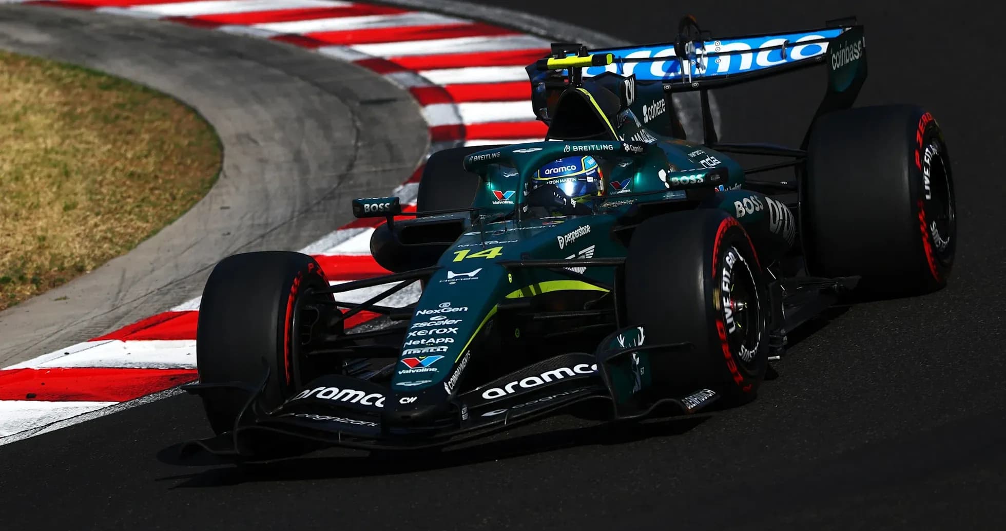 Formula 1 car navigating a sharp corner on track Formula 1 car navigating a sharp corner on track