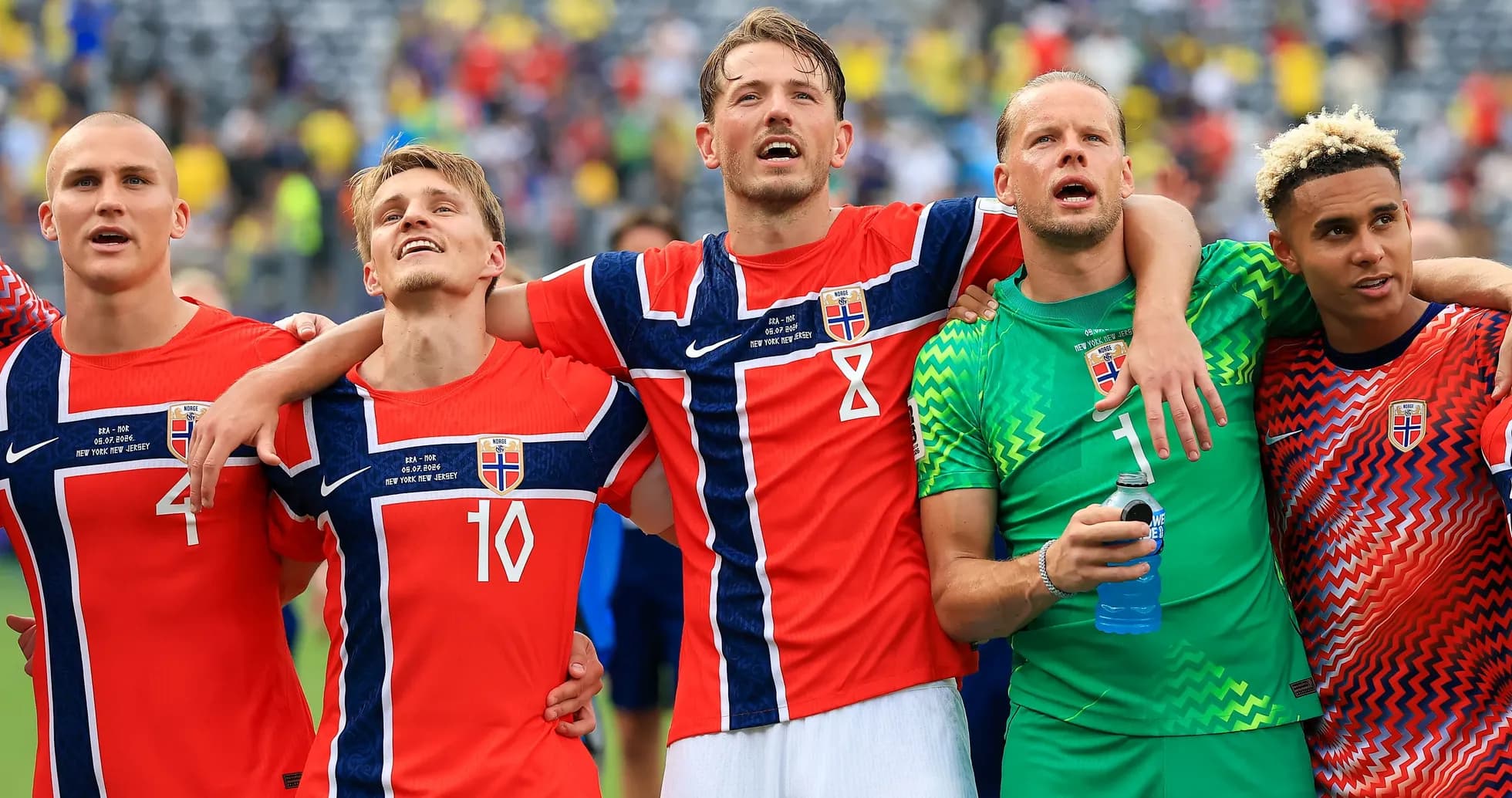 Norwegian football players celebrating after a match Norwegian football players celebrating after a match