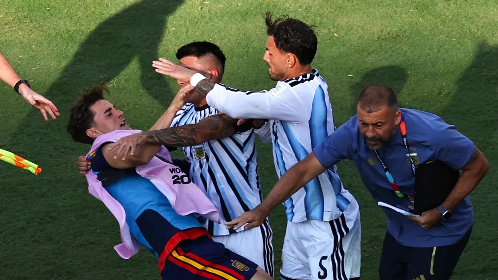 Players celebrating on the field after match Players celebrating on the field after match