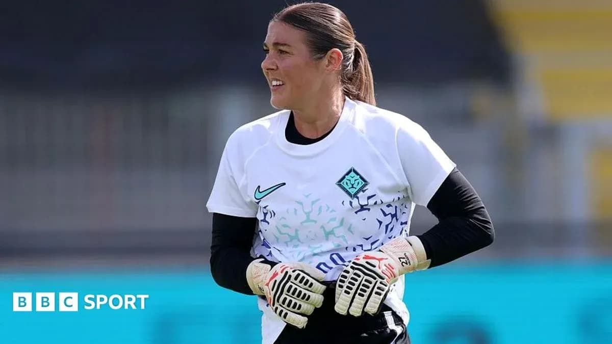 Goalkeeper training in white jersey during session Goalkeeper training in white jersey during session