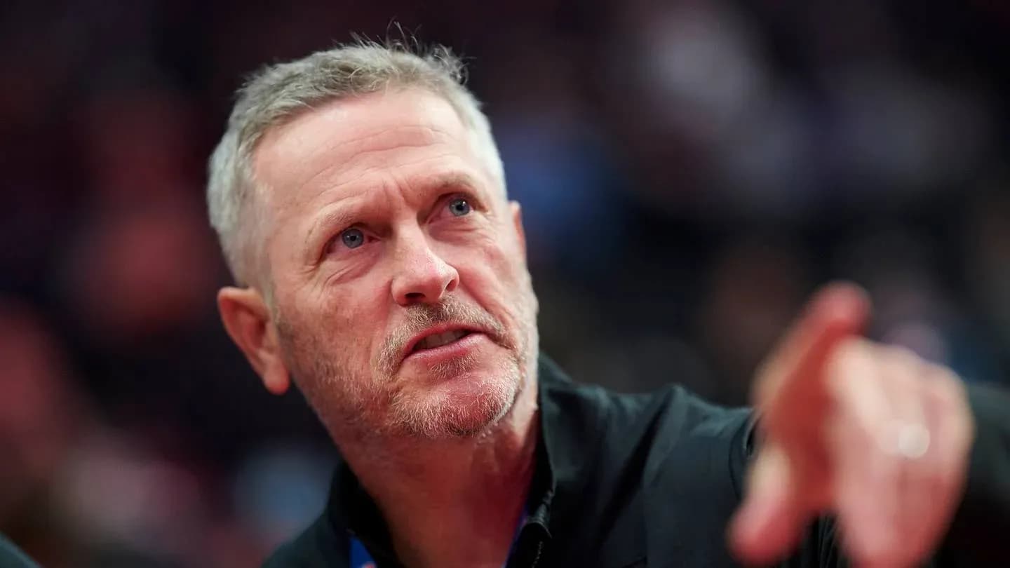 Coach gesturing during a sporting event Coach gesturing during a sporting event
