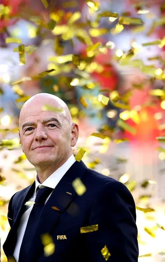 FIFA official surrounded by confetti at event FIFA official surrounded by confetti at event