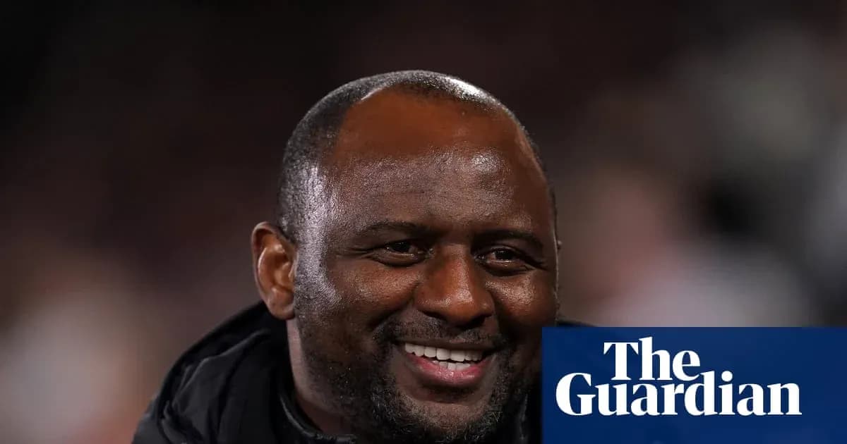 Coach smiling during match at the stadium Coach smiling during match at the stadium