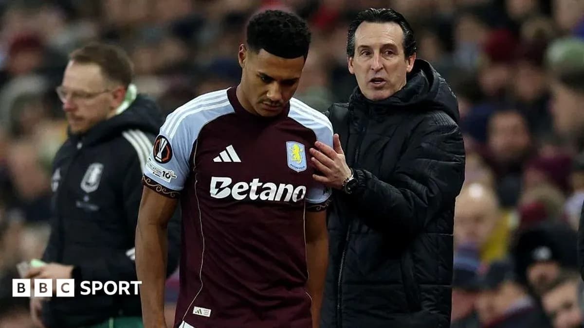 Aston Villa player talks to coach during match Aston Villa player talks to coach during match