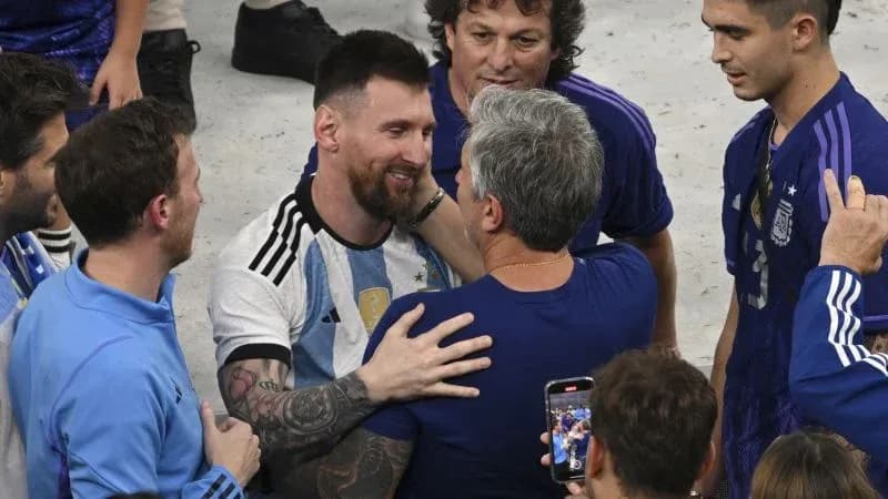 Lionel Messi celebrating with teammates after match Lionel Messi celebrating with teammates after match