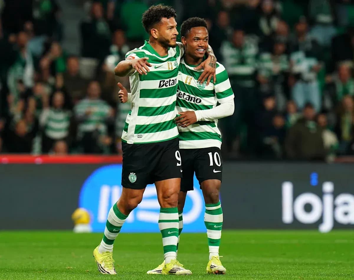 Sporting players celebrating a goal on field Sporting players celebrating a goal on field