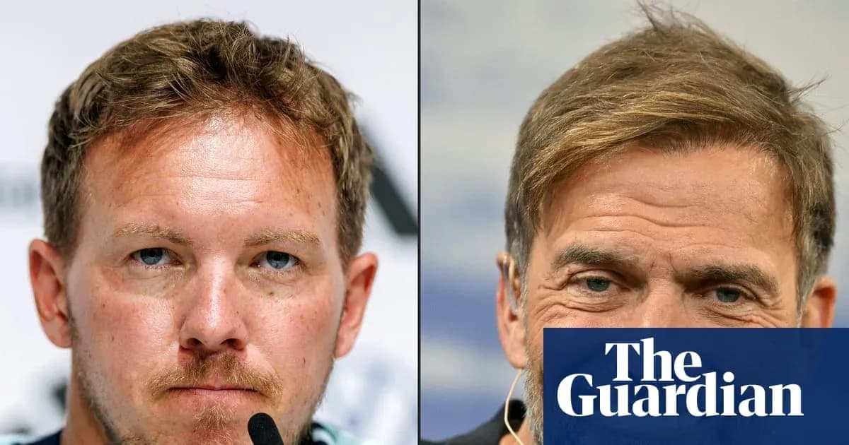 Two coaches at press conference facing camera Two coaches at press conference facing camera