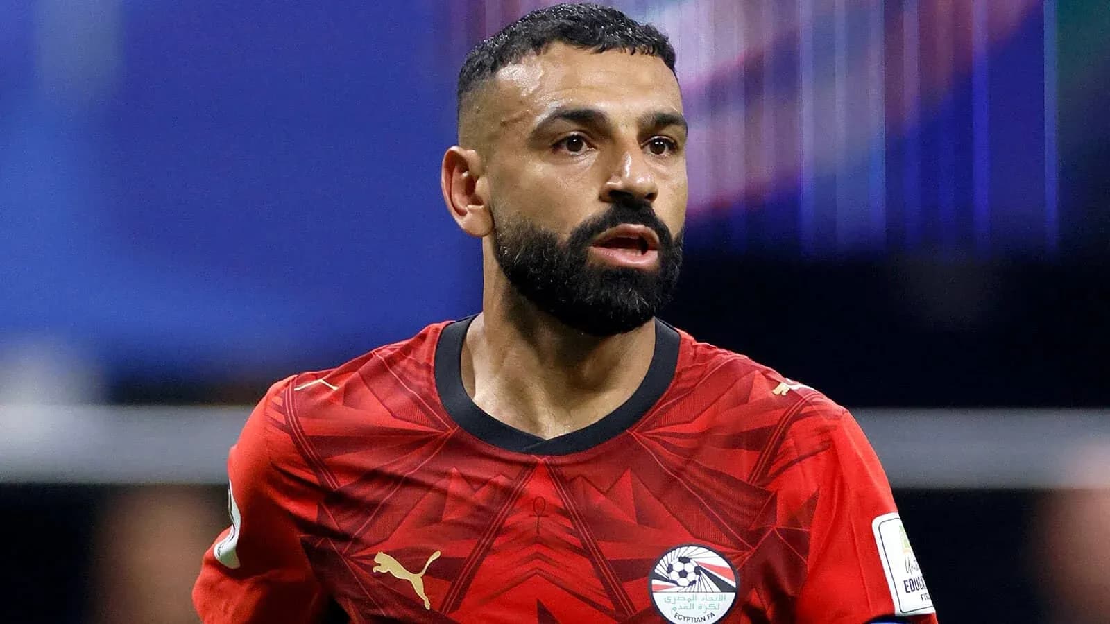 Futbolchi o'yin paytida harakatda Futbolchi o'yin paytida harakatda