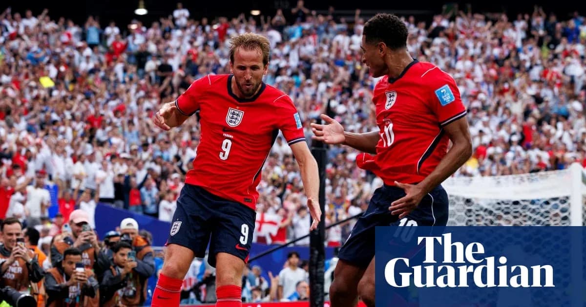 Harry Kane celebrating goal with teammate during match Harry Kane celebrating goal with teammate during match