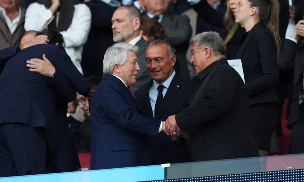 Officials shaking hands in the stadium stands Officials shaking hands in the stadium stands