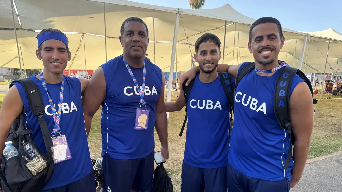Cuban team members posing together in blue jerseys Cuban team members posing together in blue jerseys