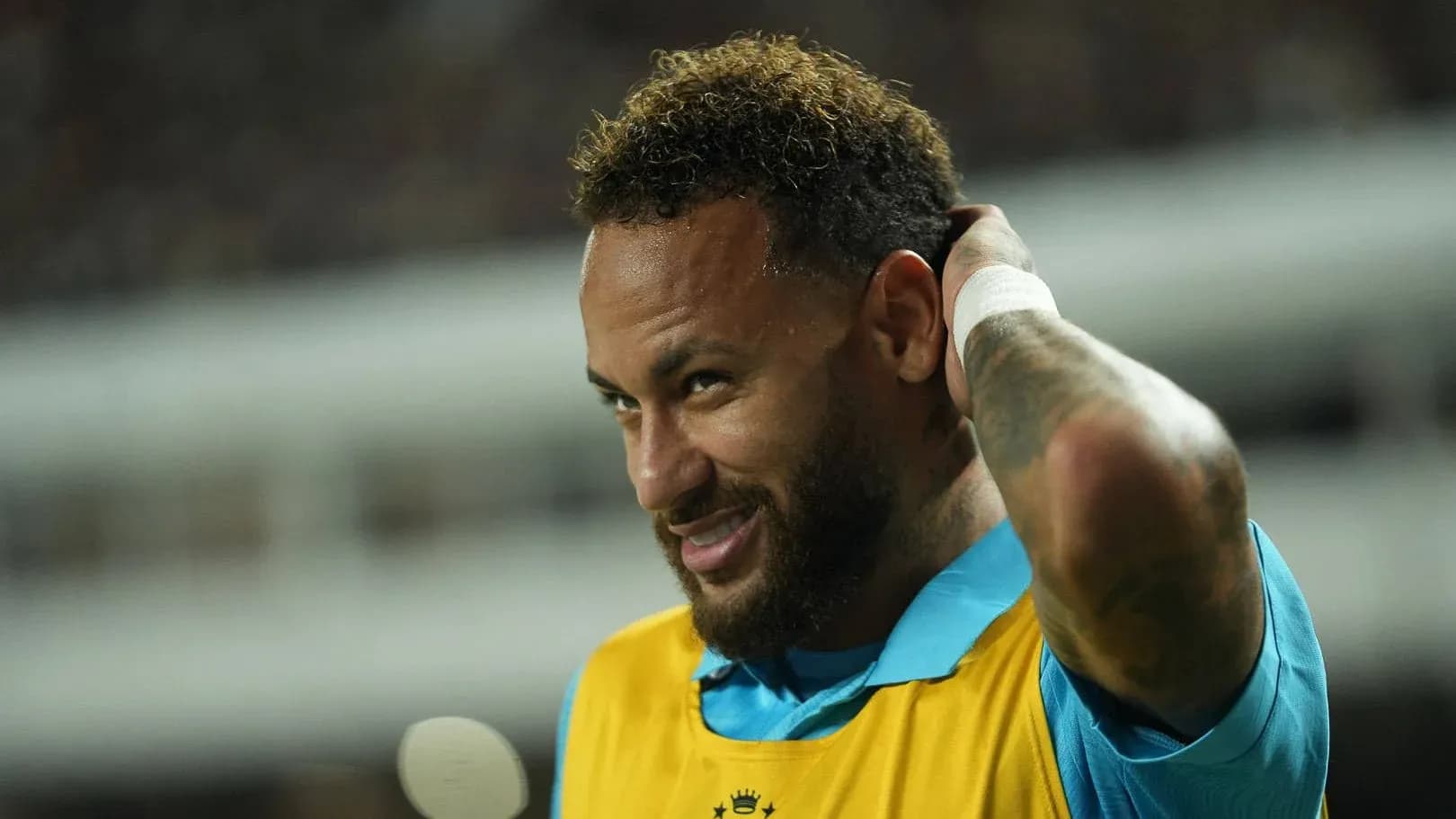 Neymar adjusting his hair during warm-up Neymar adjusting his hair during warm-up