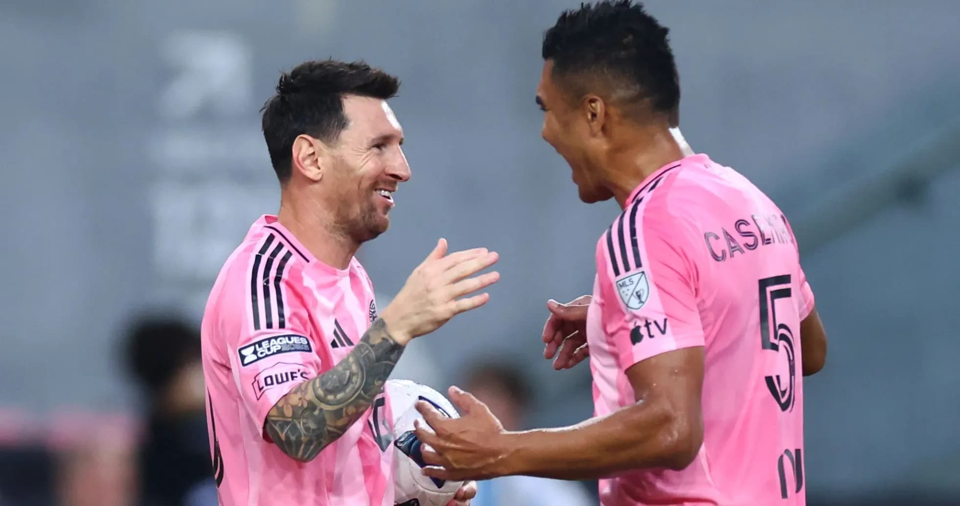 Messi and teammate celebrating a goal together Messi and teammate celebrating a goal together