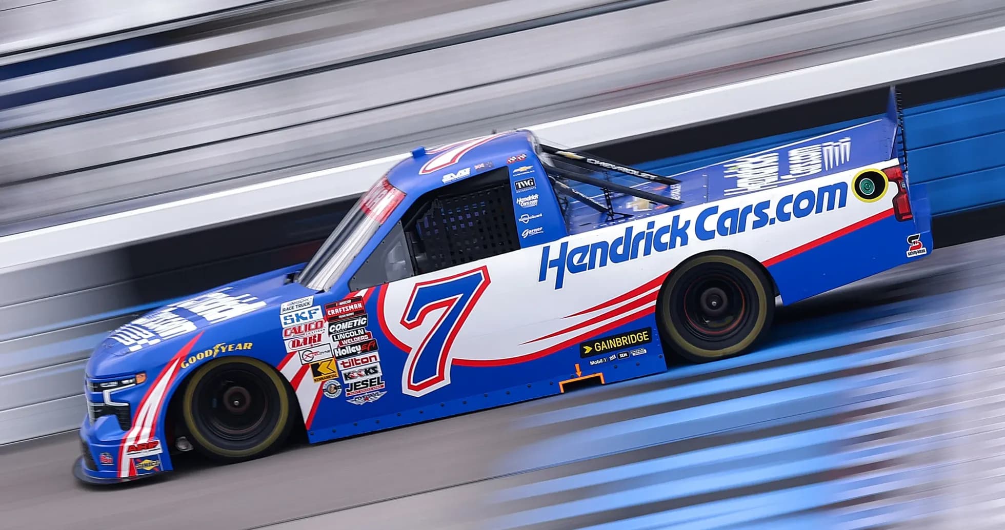 HendrickCars.com truck racing on the track HendrickCars.com truck racing on the track