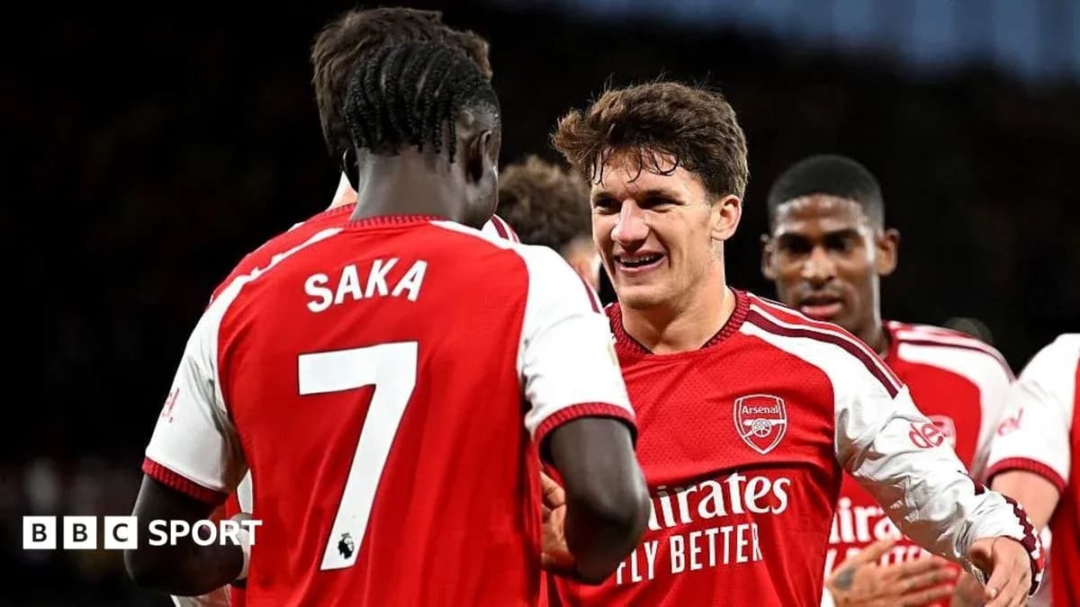Arsenal players celebrating a goal during match Arsenal players celebrating a goal during match