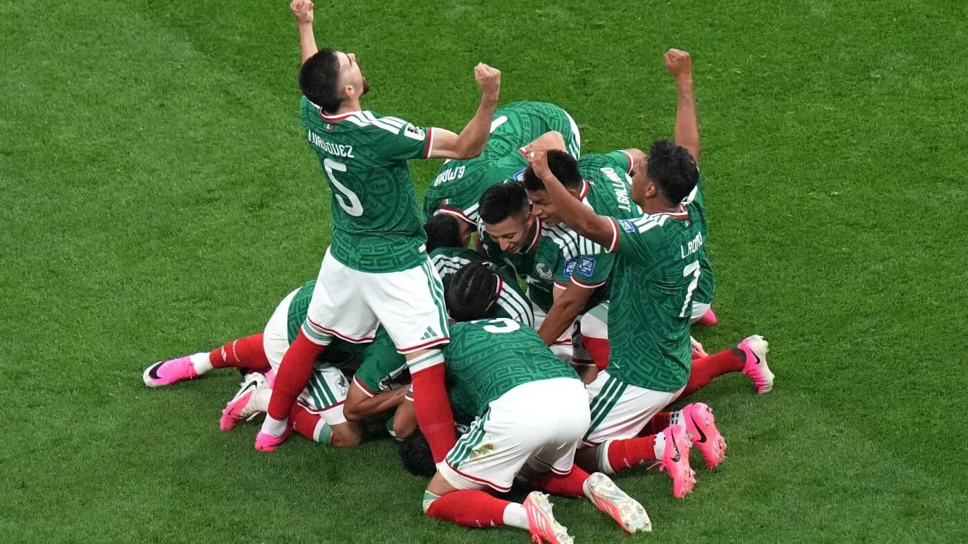 Mexican players celebrating after scoring a goal Mexican players celebrating after scoring a goal