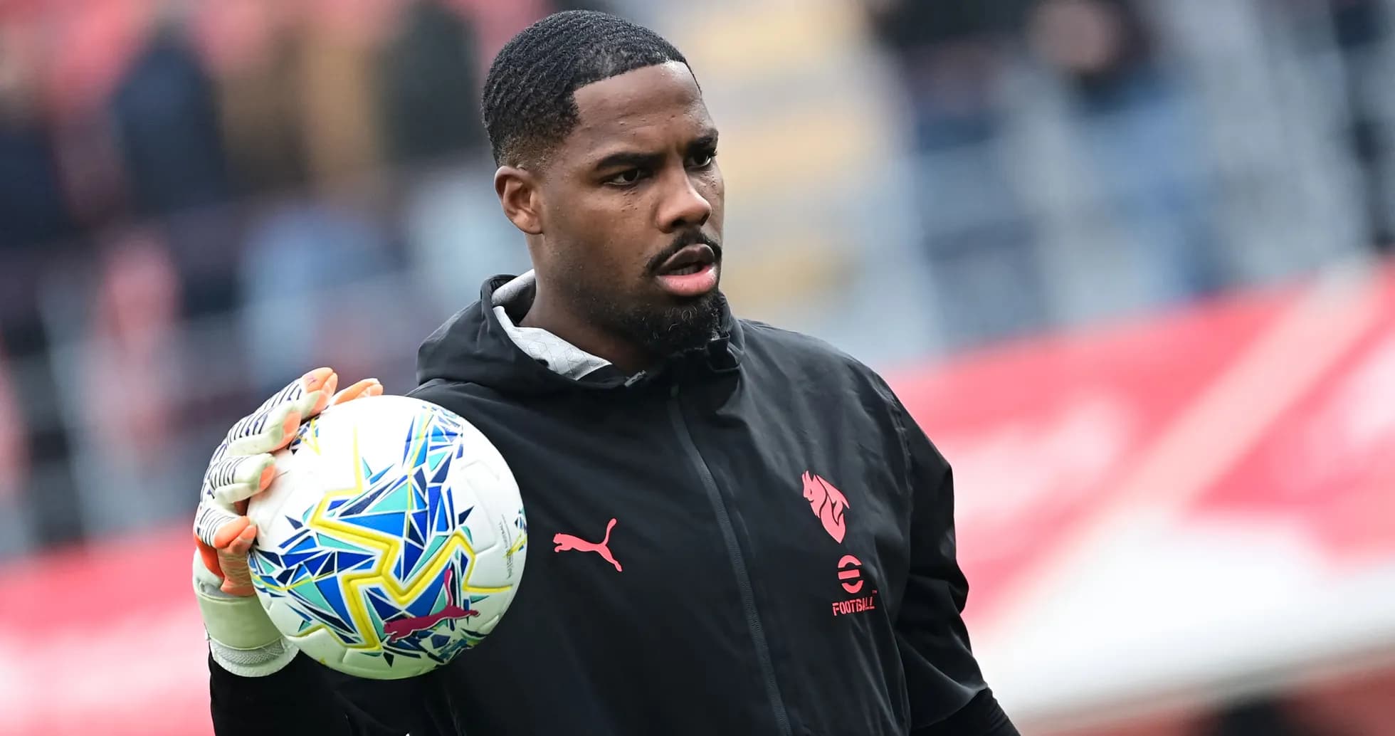 Goalkeeper holding a ball before the match Goalkeeper holding a ball before the match