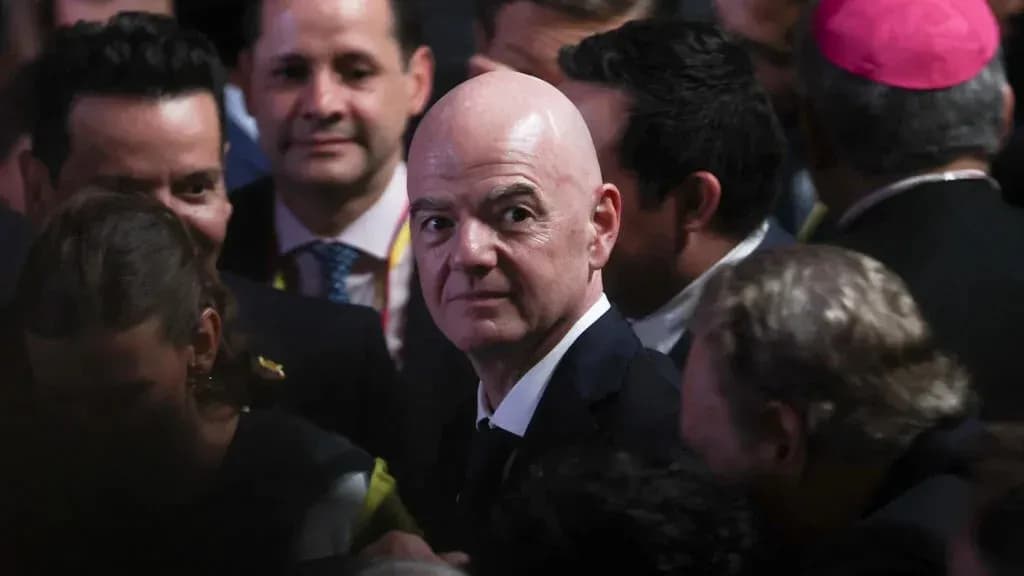 FIFA president in crowded event atmosphere FIFA president in crowded event atmosphere
