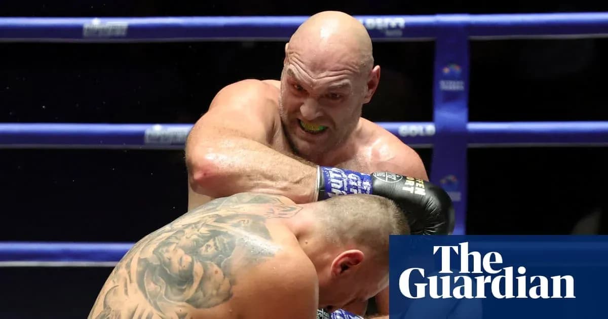 Boxer delivering a punch during a match Boxer delivering a punch during a match