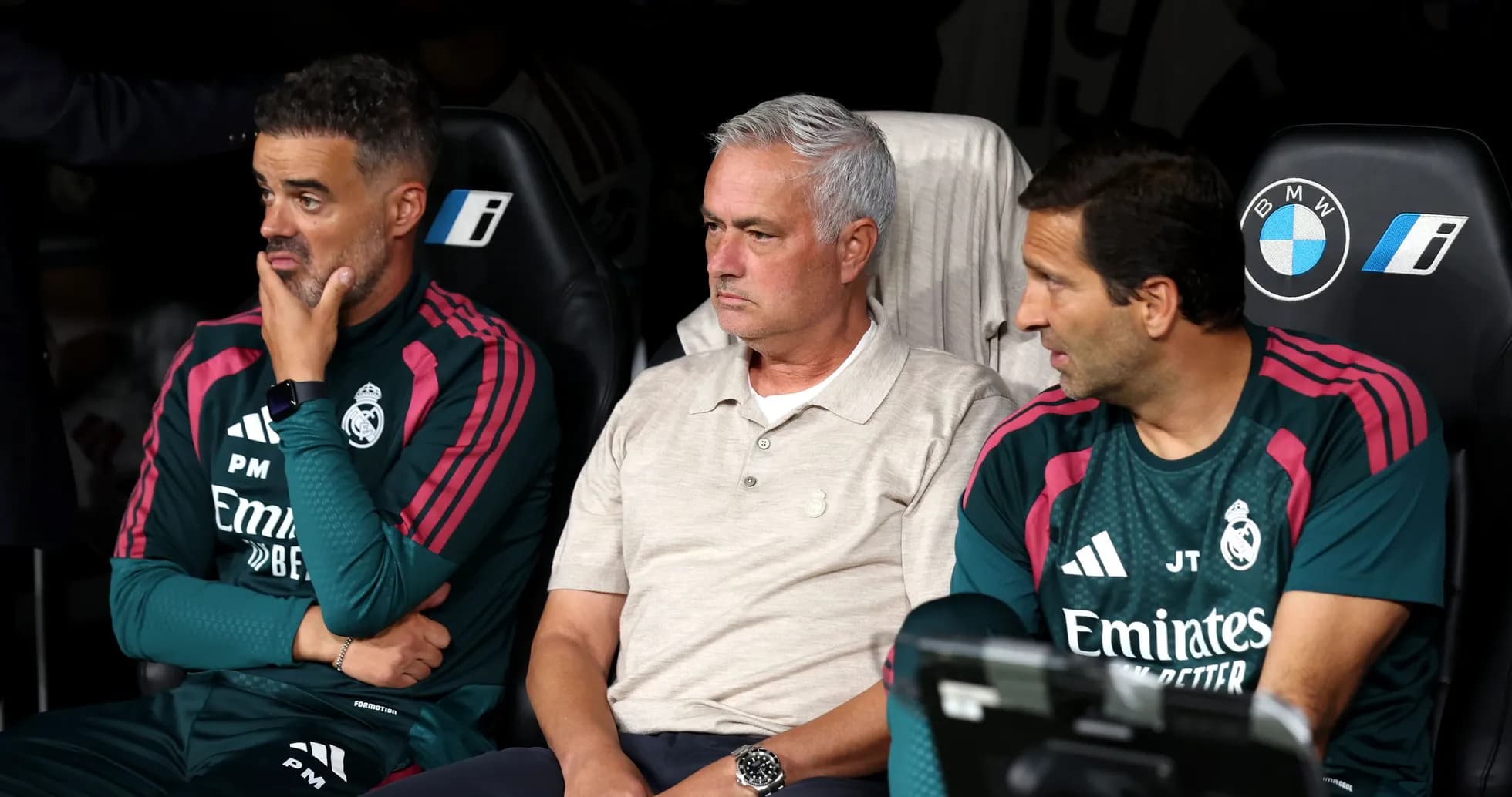 Coaches seated on bench during match Coaches seated on bench during match