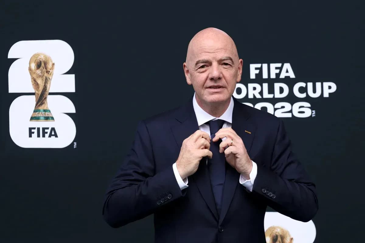 FIFA president adjusting tie before World Cup event FIFA president adjusting tie before World Cup event